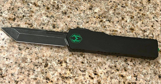 Heretic Knives Colossus T/E Blade Show '23 Black Slab Handle w/ Deep Engraved Heretic Green Logo Battle Black Blade