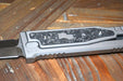 REATE EXO-M OTF GRAVITY KNIFE TITANIUM/CARBON FIBER 2.95" DOUBLE EDGE SATIN