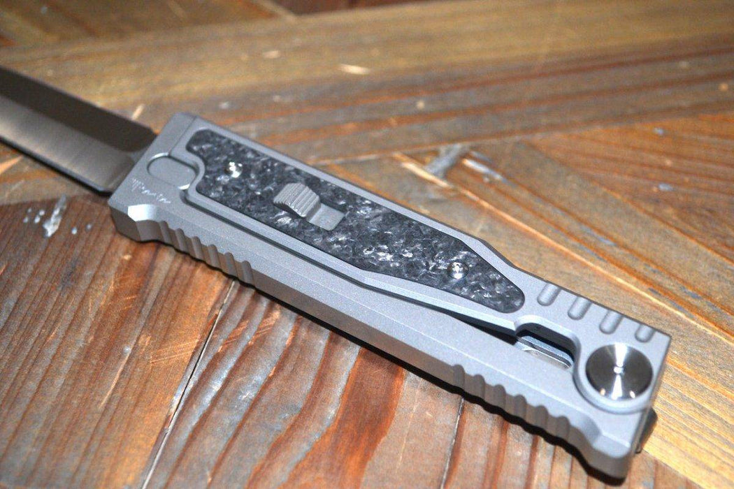 REATE EXO-M OTF GRAVITY KNIFE TITANIUM/CARBON FIBER 2.95" DOUBLE EDGE SATIN